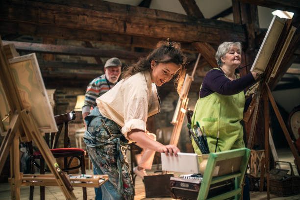 istock group of seniors attending art class with teacher 1488277872