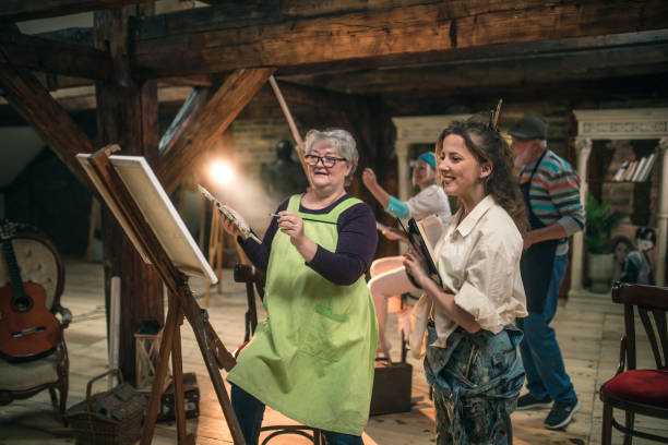 istock group of seniors attending art class with teacher 1488277960