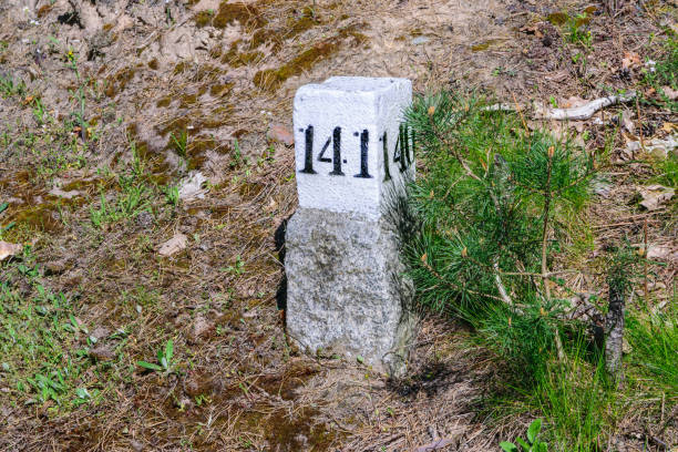 istock Boundary post with numbers of forest area divisions 1488280829