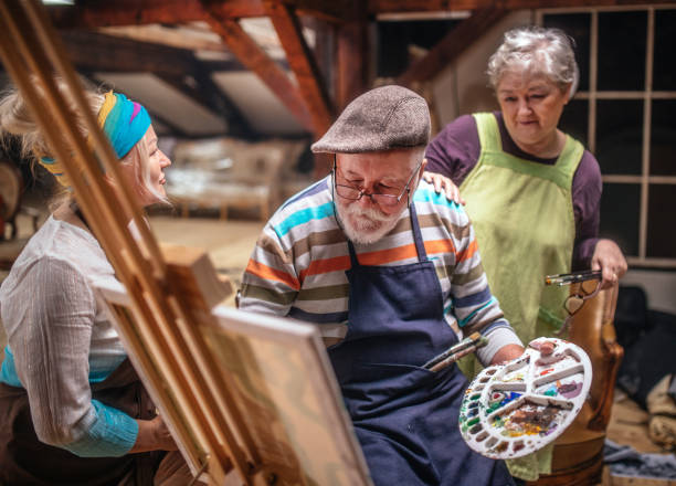 istock group of seniors attending art class with teacher 1488285227