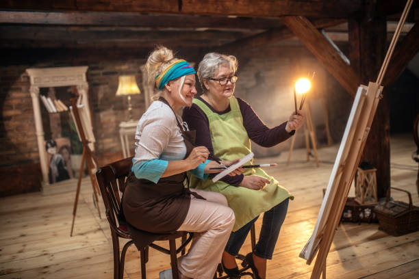 istock group of seniors attending art class with teacher 1488285232
