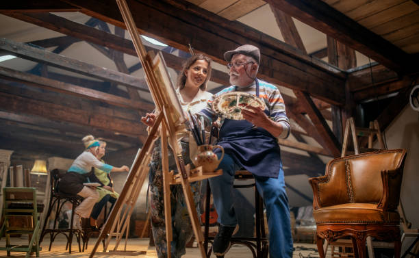 istock group of seniors attending art class with teacher 1488285247
