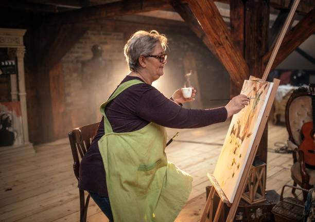 istock group of seniors attending art class with teacher 1488285297
