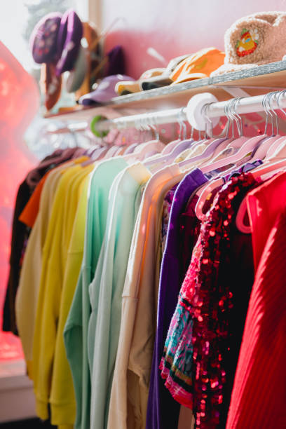 istock Colorful Vibrant Clothing Rack at a Thrift Store 1488288566
