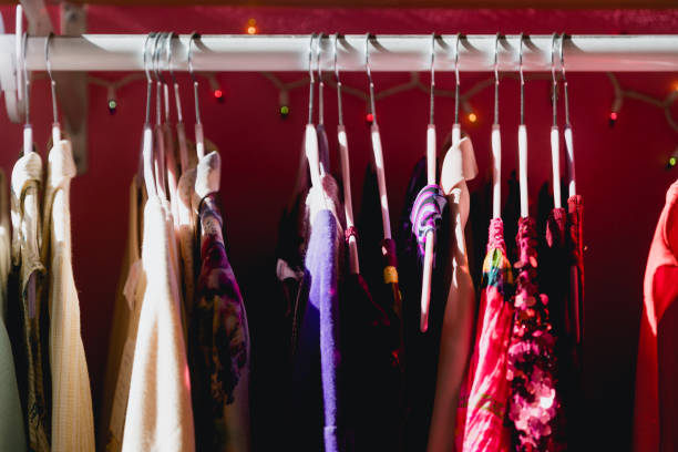 istock Colorful Vibrant Clothing Rack at a Thrift Store 1488288570