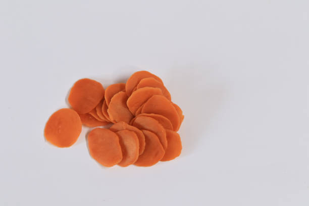 istock Raw crackers are orange in color on a white background 1488290339