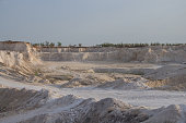 Limestone quarry in the village of Chalk Hills, West-Kazakhstan region, the city of Uralsk. Lime quarry for the production of bricks. Piles of chalk stones.