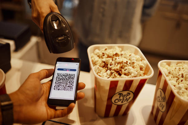 scanning online movie ticket! - ticket movie theater movie movie ticket imagens e fotografias de stock