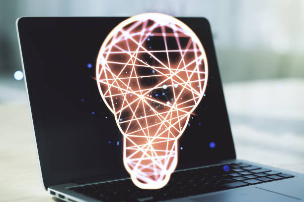 istock Creative light bulb hologram on modern laptop background, idea concept. Multiexposure 1488300660