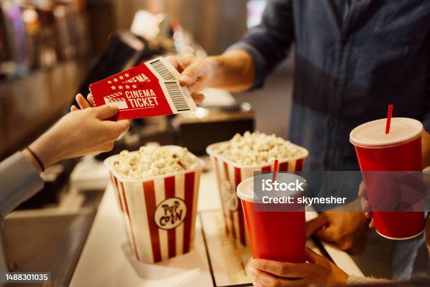Buying Movie Tickets Stock Photo - Download Image Now - Movie Theater, Film Industry, Movie