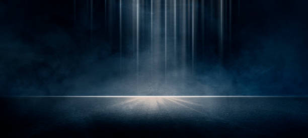 istock A dark empty street, dark blue background, an empty dark scene, neon light, spotlights The asphalt floor and studio room with smoke float up the interior texture. night view 1488303770