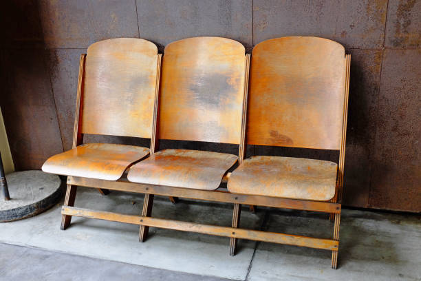 Set three wooden chairs at balcony.