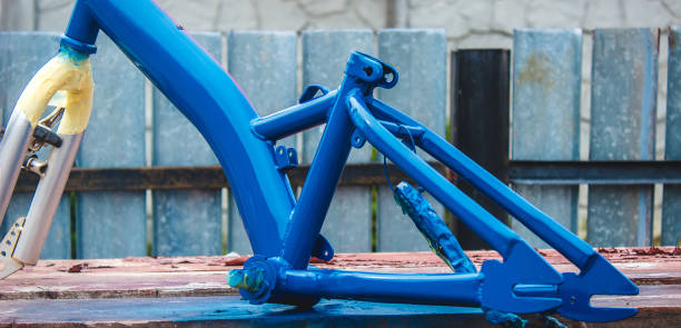 istock a man paints a bicycle with spray paint. 1488306655