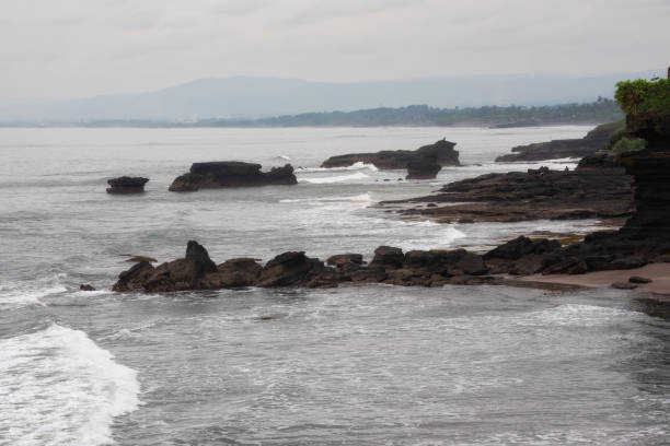 istock Rocky sea coast hit by waves on Bali island 1488307206