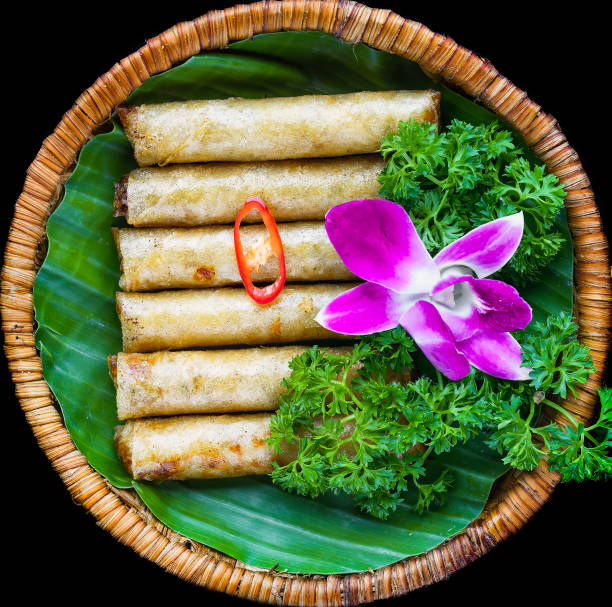istock Traditional fried vietnamese spring rolls with pork, rice paper on black background 1488311318