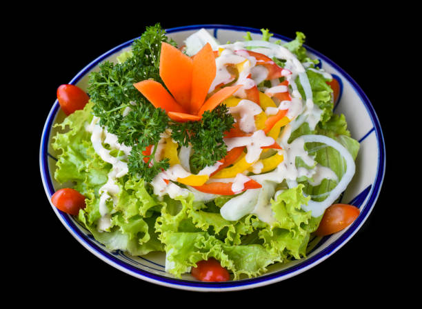istock Fresh Vietnamese salad with vegetables on black background side view 1488311337