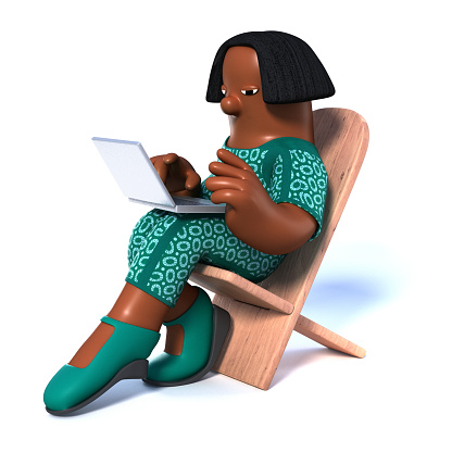 African young woman sitting on a wooden chair is reading social networks on a laptop