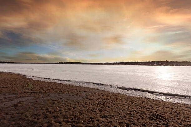 istock early spring when snow and ice still cover the lake 1488312160