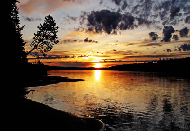 sunset in the summer by the river in Lycksele
