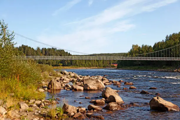 Umea, Norrland Sweden - August 14, 2019: suspension bridge over the Ume River