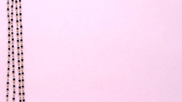Background for needlework and jewelry, DIY. chain with beads. Blur effect. Weak focus.
