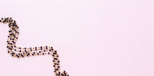 Background for needlework and jewelry, DIY. chain with beads. Blur effect. Weak focus.