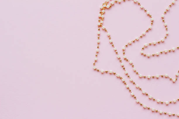 Background for needlework and jewelry, DIY. chain with beads. Blur effect. Weak focus.