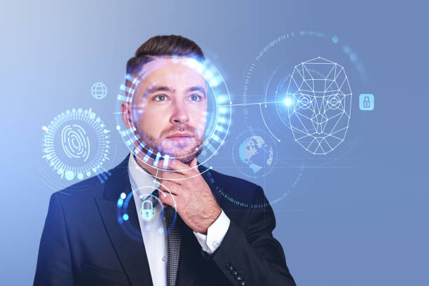 istock Smiling businessman and biometric scanning, digital hologram wit 1488319701