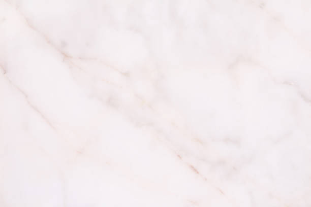 istock White marble seamless glitter texture background, counter top view of tile stone floor in natural pattern. 1488320376