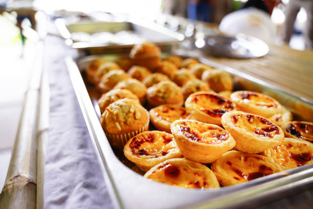 istock Egg tarts or delicious Portuguese egg tarts on a tray 1488320976