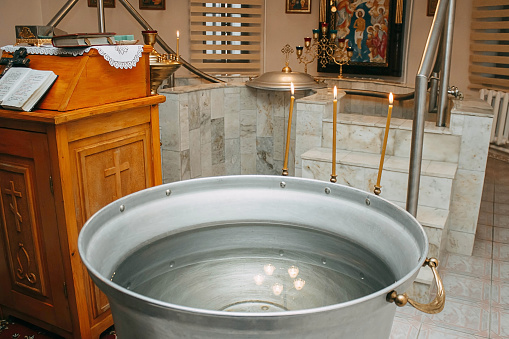 Orthodox Church. The rite of infant baptism. Font.