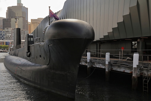 Submarine on display at the wharf outside the Australian National Maritime Museum after being decommissioned from service and preserved as a museum ship. Darling Harbour-Sydney-NSW-Australia.