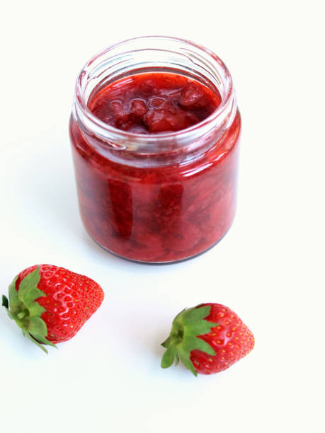 istock strawberry jam in a bottle. 1488331328