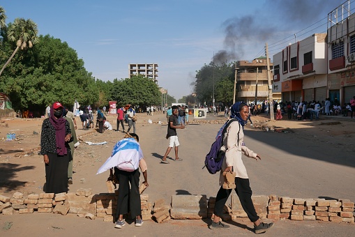 Khartoum, Sudan – 10.27.2022: Young Sudanese protestors barricade the streets on the one year anniversary of military coup