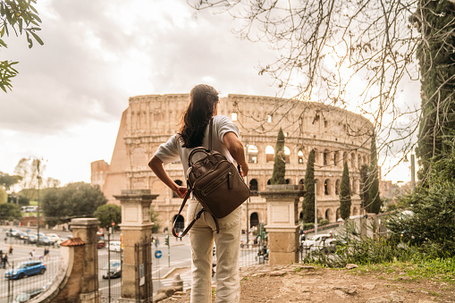 Tourist woman in Rome by the Coliseum