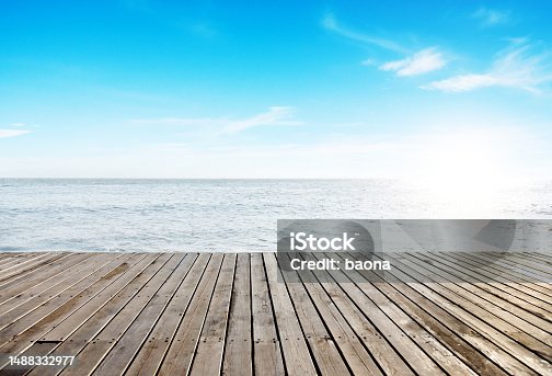 istock Wooden deck at the seaside 1488332977