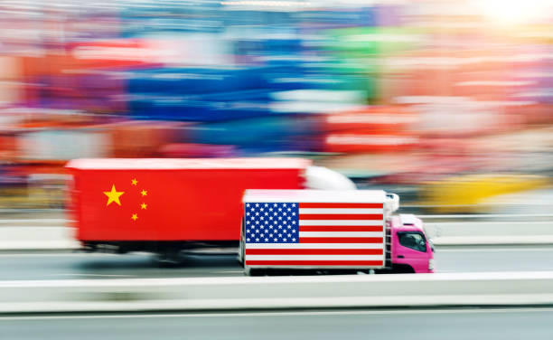 istock Driving trucks with USA and Chinese flags 1488333209