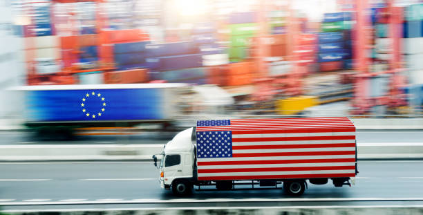 istock Driving trucks with USA and EU flag 1488333220