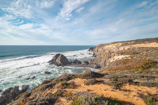 istock Typical scenery on the Atlantic coast. High rocky cliffs with sandy beaches in Odemira region, western Portugal. Wandering along the Fisherman Trail, Rota Vicentina 1488333233