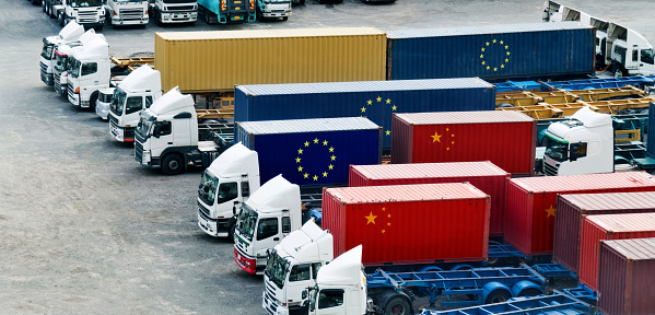 Trucks with EU and Chinese flags