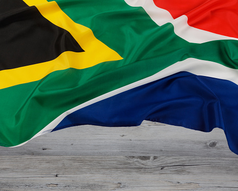 Close up of the official flag of South Africa a country at the southern most tip of Africa with copy space