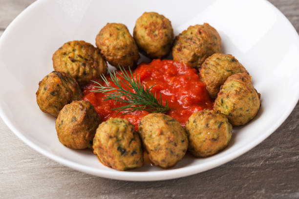 istock Atlantic salmon meatballs with spinach served with tomato sauce 1488336108