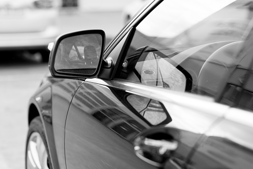 Side view of a black car - Car side mirror