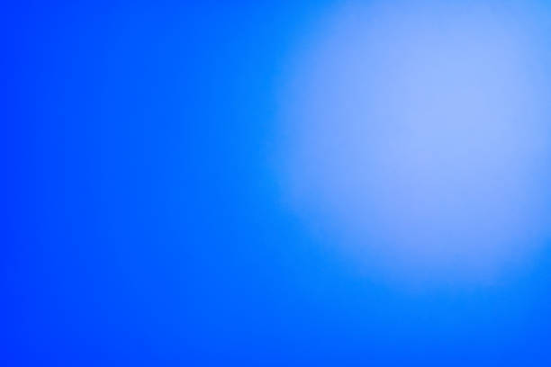 istock The background image shows a beautifully reflected gradation of blue bokeh. 1488337780