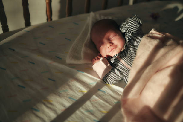 istock Sleeping newborn baby girl 1488338720