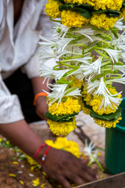 istock Flower Stall Selling Garlands for Temple Offerings 1488341652
