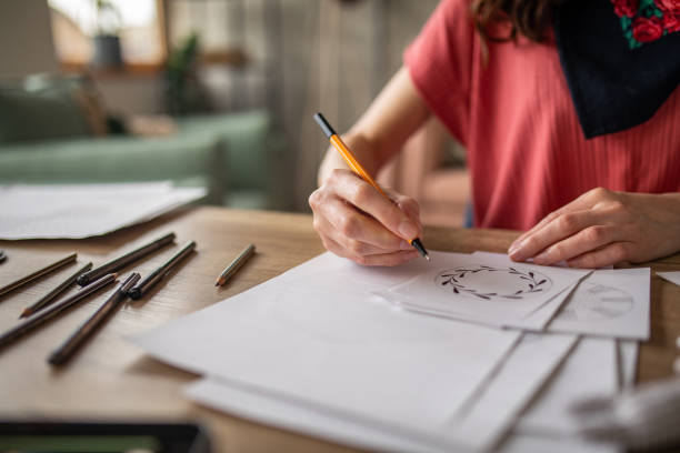 istock Woman working on a design at home 1488345794