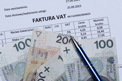 Polish VAT invoice for grain, retail, with Polish money PLN in close-up