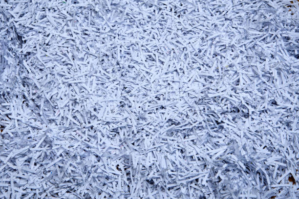 istock Destroyed documents. Paper scraps filling the entire frame 1488347622