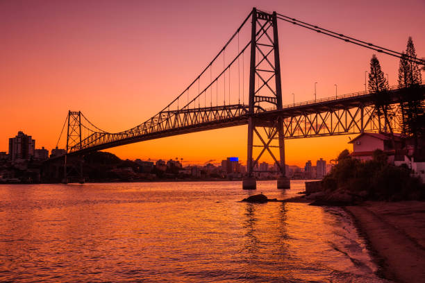 istock Hercilio luz old bridge with warm sunset in Florianopolis 1488353085
